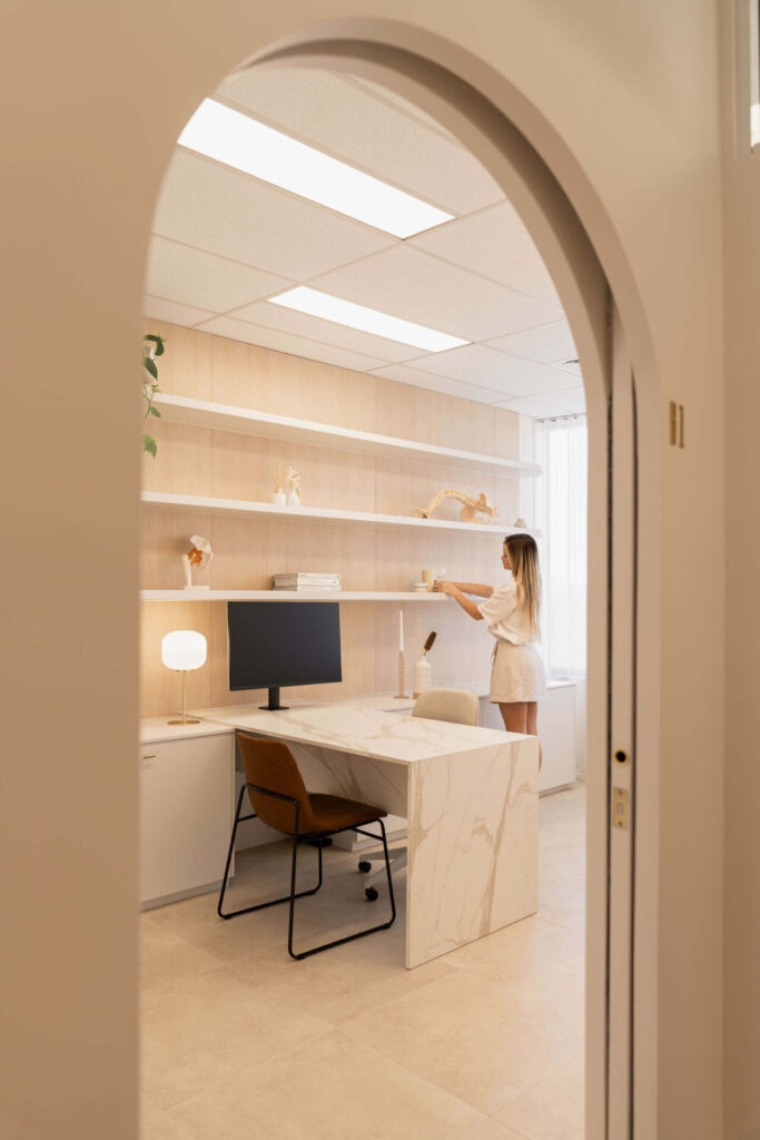 Featured wall pendant lights, bespoke timber curved frame and neutral colour palette for this medical fit out for Sycamore Health, Total Fitouts Sunny Coast South
